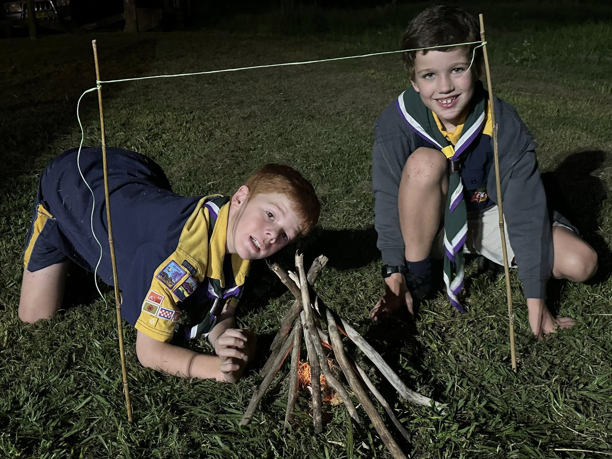 Cubs learning how to light camp fires